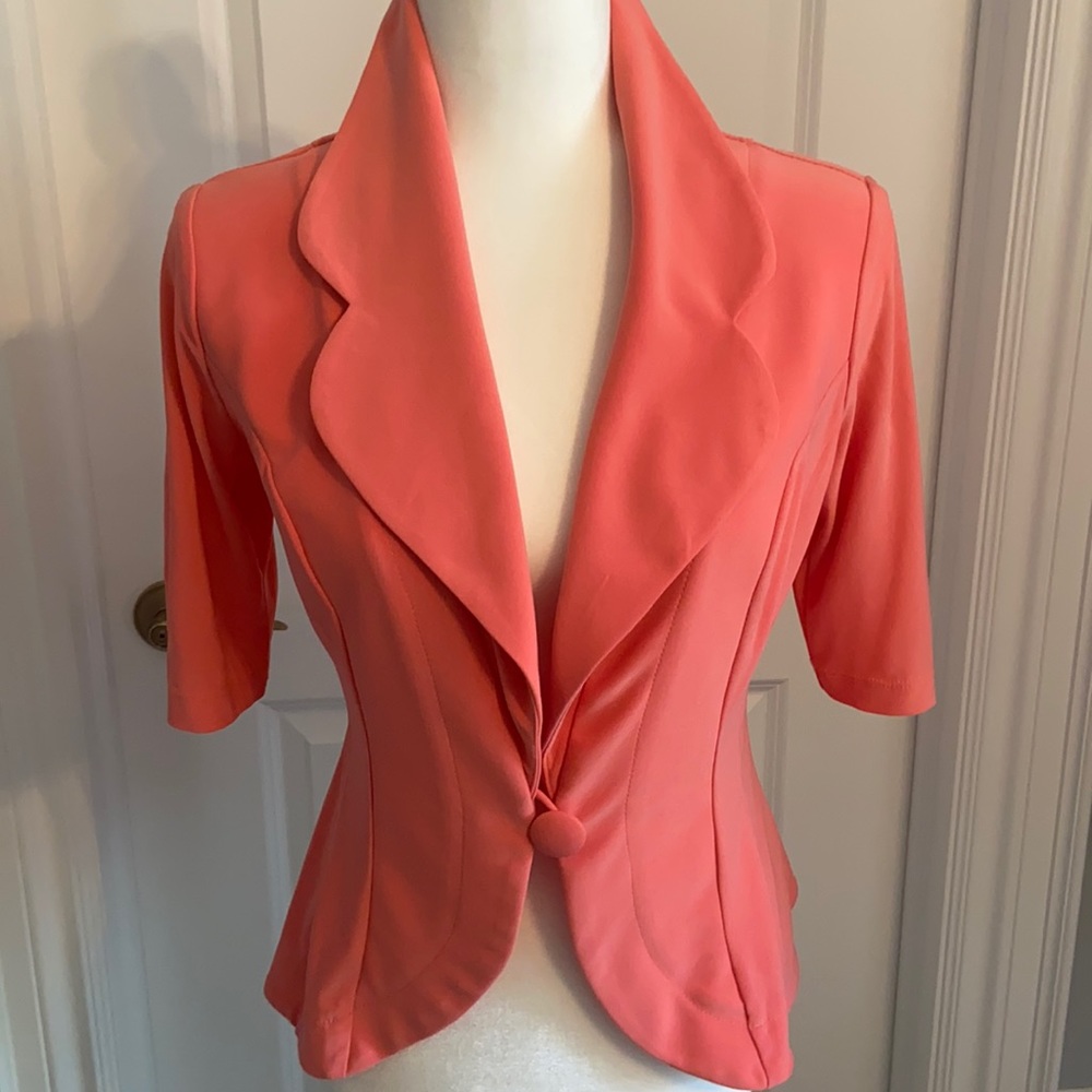Marallis coral colour spring/summer jacket. Small
